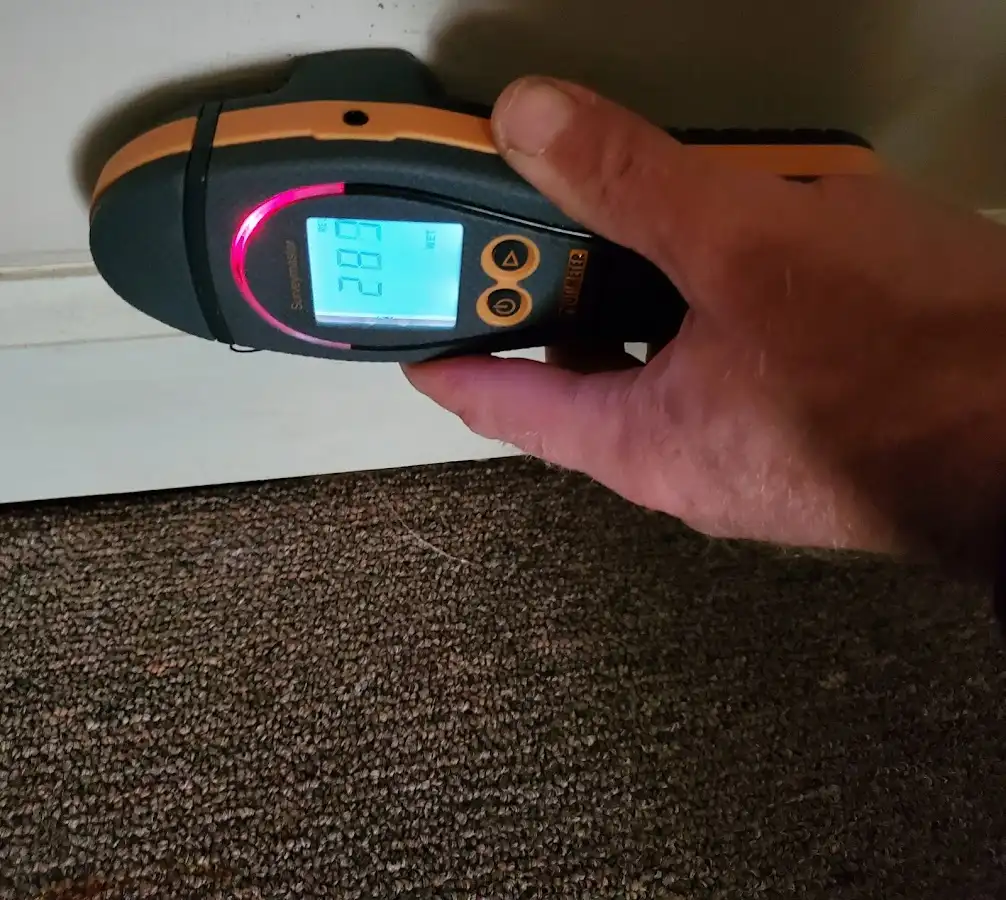 Moisture detection at baseboard during Burst Pipe Cleanup in New London